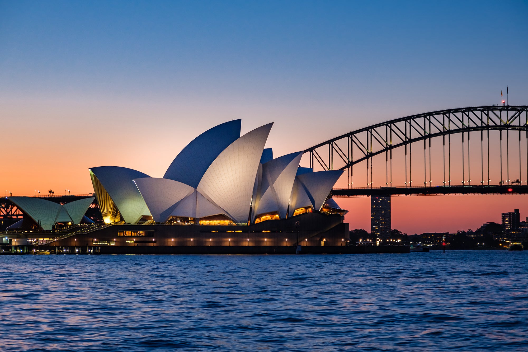 Sydney Opera House and Sydney Harbour Bridge at sunset